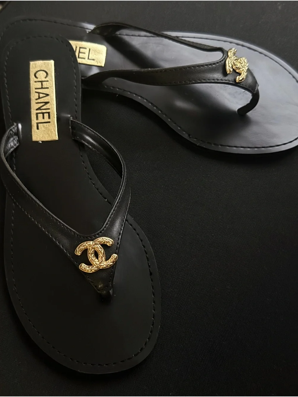 Black Leather Thong Sandals with Gold Logos